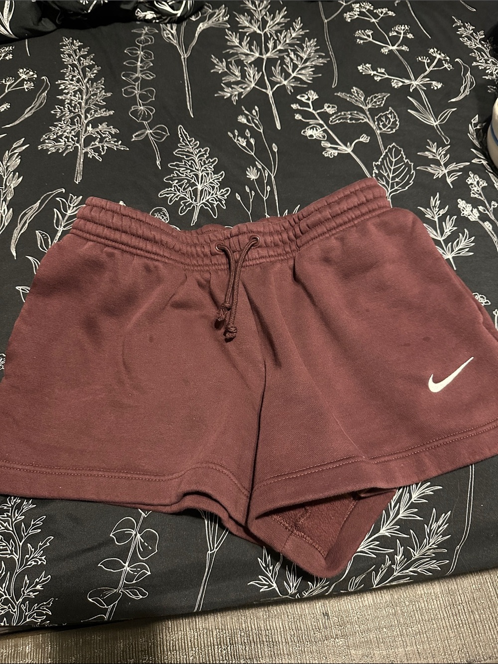 Nike Burgundy Women's Athletic Shorts with White Swoosh